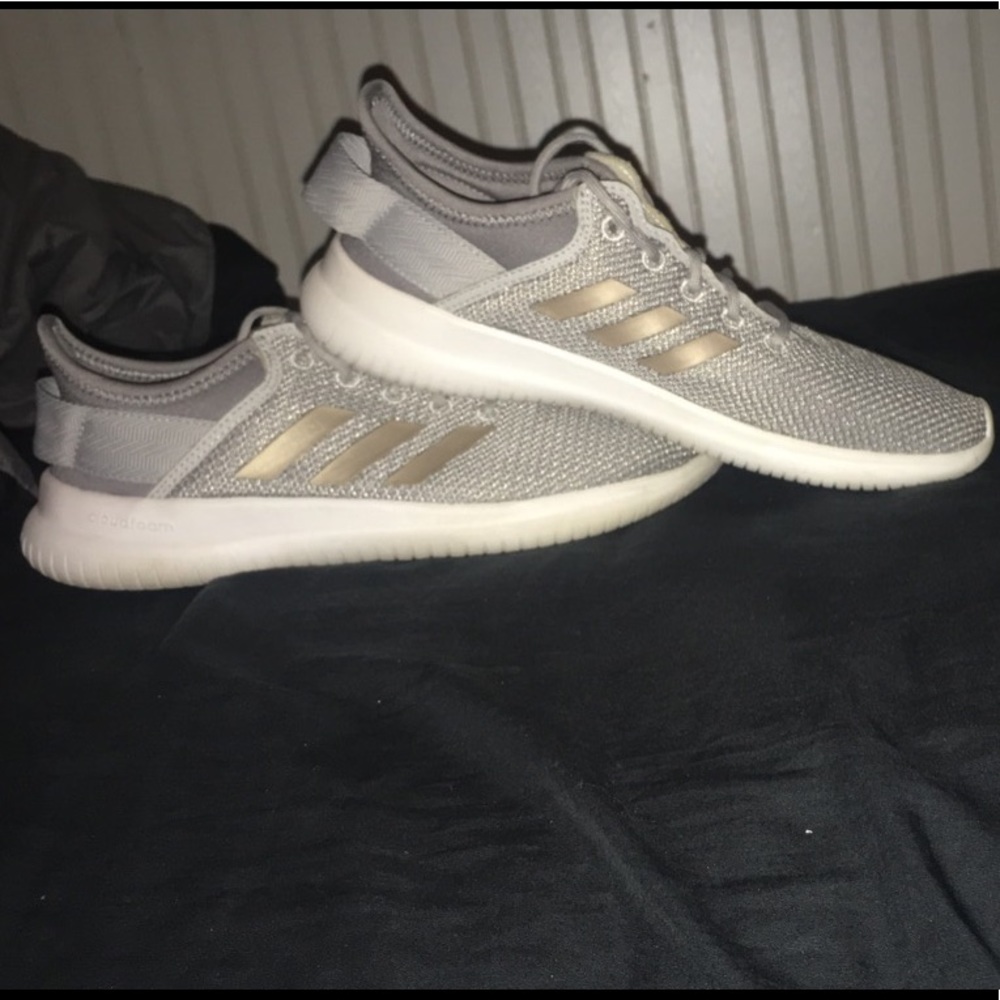 Gold and silver adidas shoes